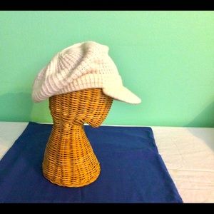 White knitted newsboy cap. BUY TODAY — PROCEEDS TO FAMILY HEART FOUNDATION!